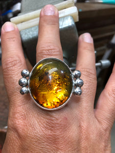 Amber ring with Stamped eagle