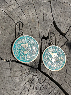 Bronze Coyolxauhqui disc earrings w patina